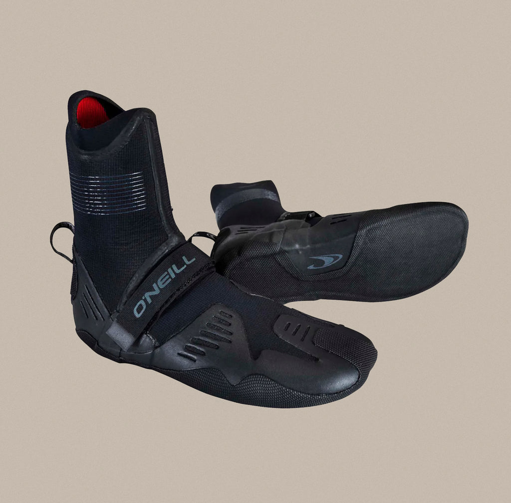 A pair of O'Neill Wetsuits Psycho Tech 7mm Round Toe boots.