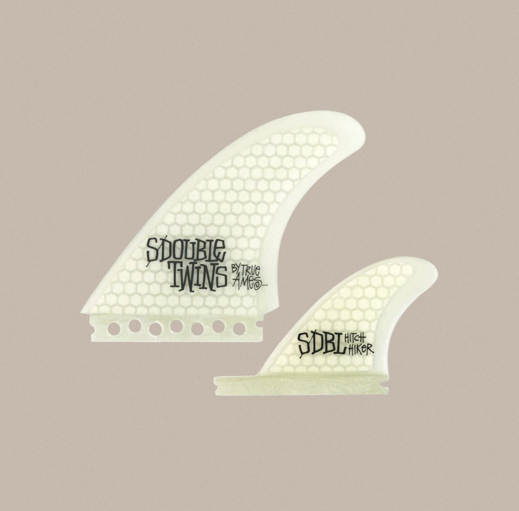 A True Ames Stussy S Double Twin Combo Futures fin set in clear hexcore.