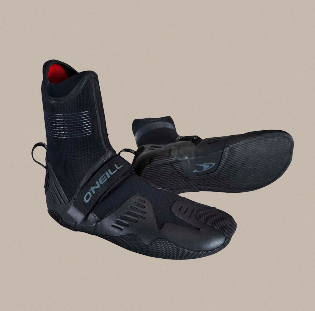 A pair of O'Neill Wetsuits Psycho Tech 5mm round toe boots.