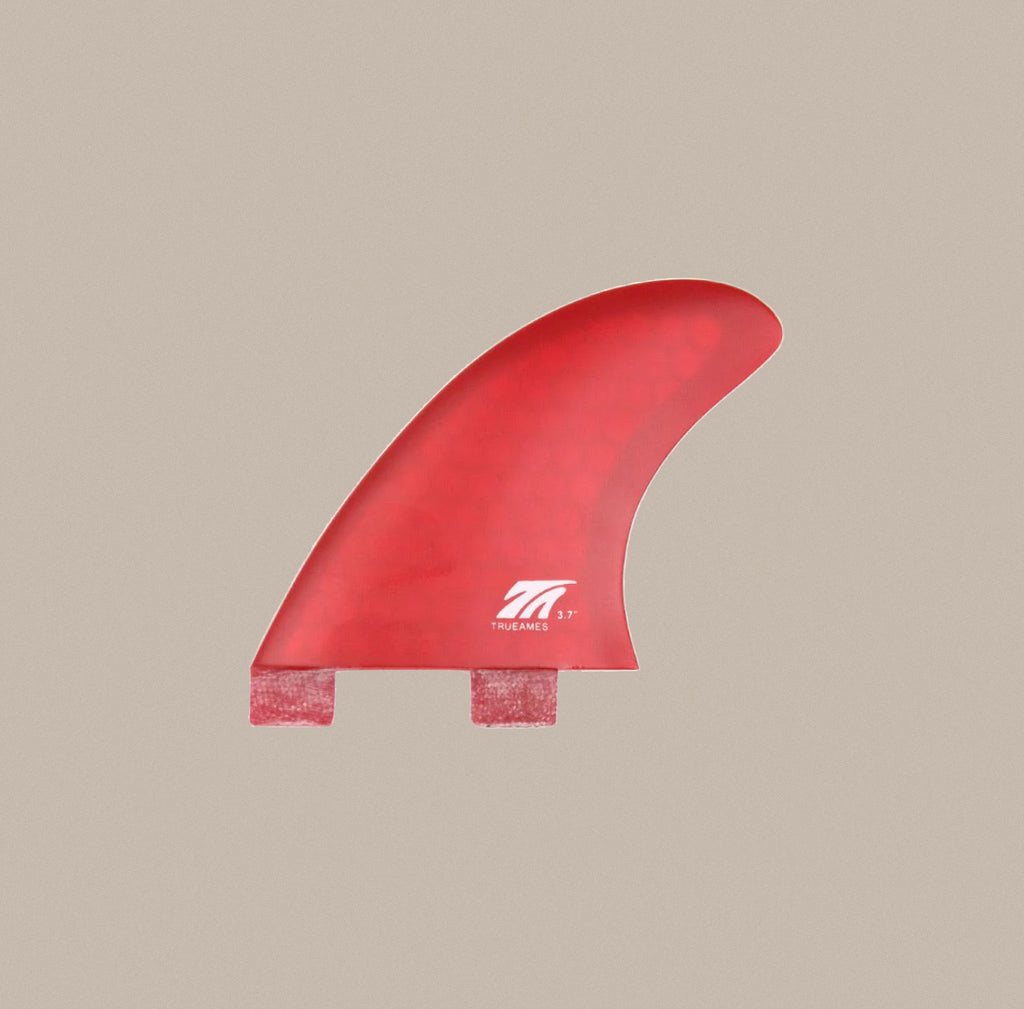 A True Ames 3.7" Side Bite FCS fin in red hexcore.