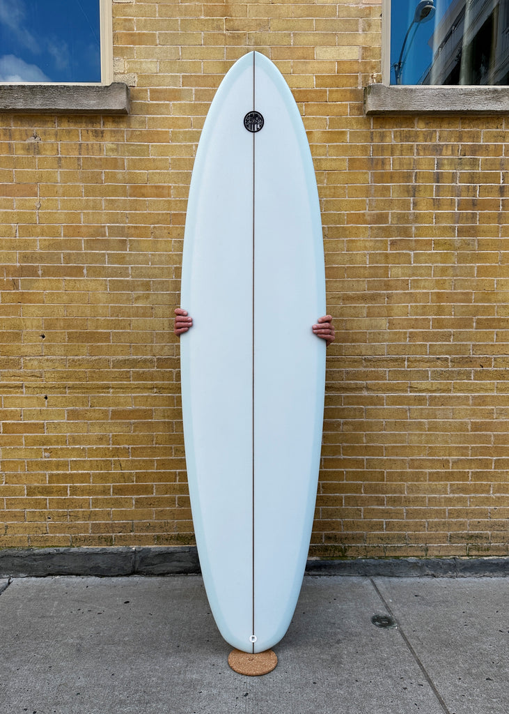 A Simon Shapes 7'2" Arch Tail Quad Egg surfboard for sale