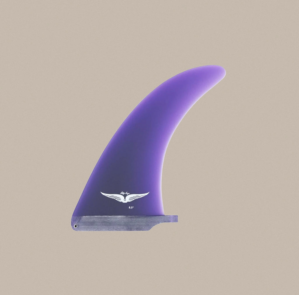 A True Ames Skip Frye single fin in purple.