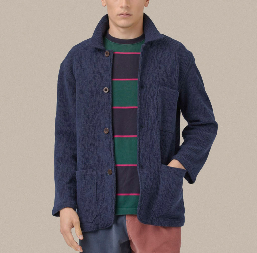 A navy chore coat in textured fabric from Portuguese Flannel.