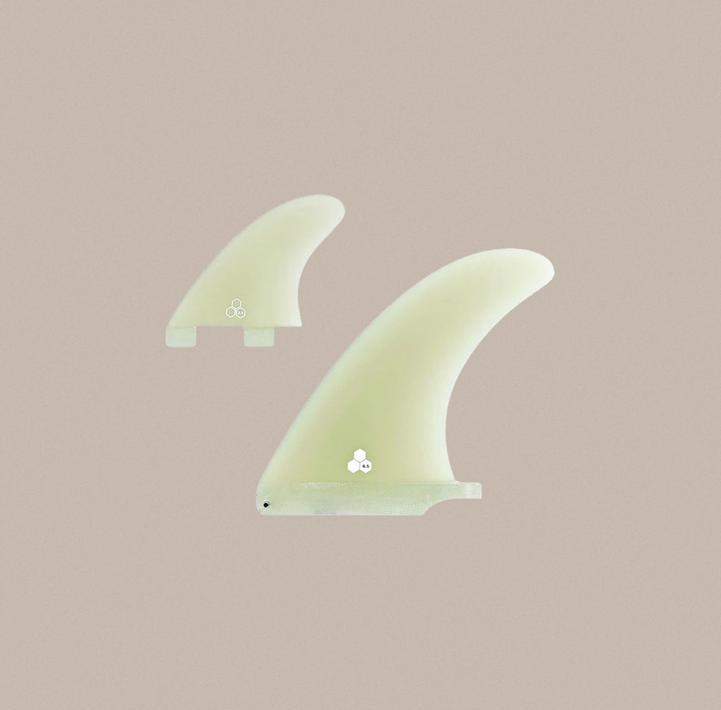 A True Ames CI Mid Combo fin set in clear. Includes a center fin plus side bites.
