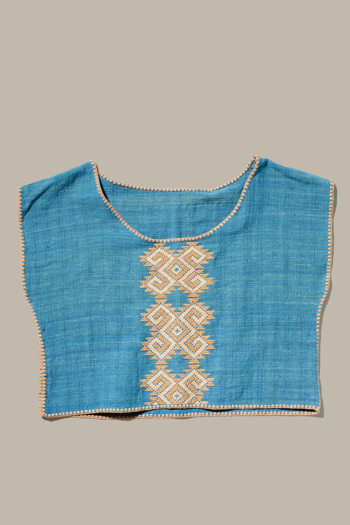 The Khadi Oaxaca Crop Top in Blue with Peach embroidery.