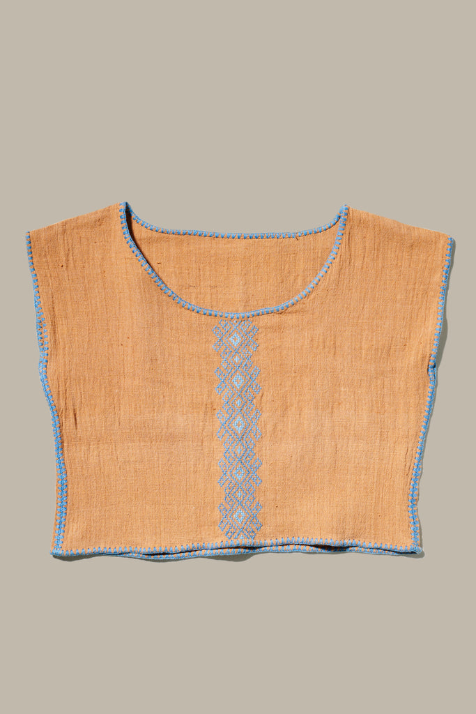 The Khadi Oaxaca Crop Top in Orange with Blue embroidery.
